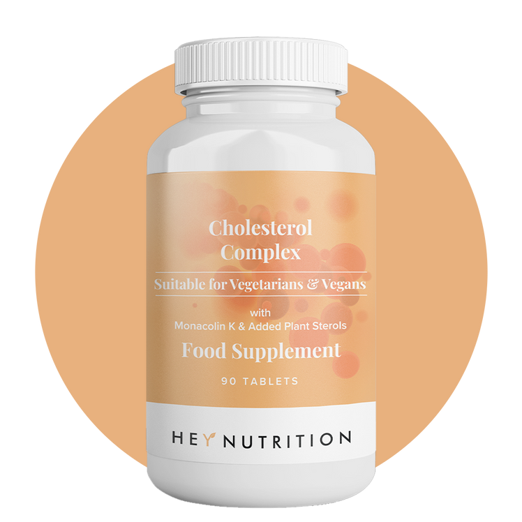 Hey Nutrition Cholesterol Complex bottle centred on a peach circle background; 90 tablets; Suitable for Vegetarians & Vegans; formula highlighted “with Monacolin K & Added Plant Sterols”; clear, front-facing product label.
