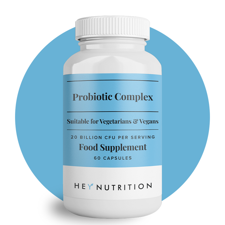 Product shot of Hey Nutrition Probiotic Complex food supplement bottle against a blue circle background, labeled as suitable for vegetarians and vegans, with 20 billion CFU per serving, 60 capsules.