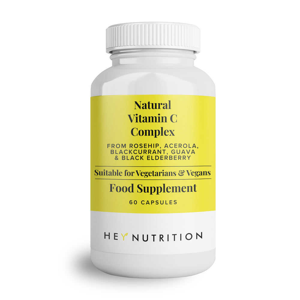 Hey Nutrition Natural Vitamin C Complex supplement bottle with a yellow label on a plain white background.