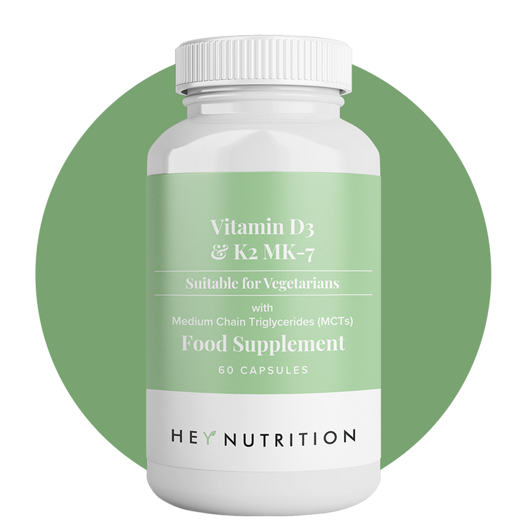 Hey Nutrition Vitamin D3 & K2 MK-7 supplement bottle on a green circular background.